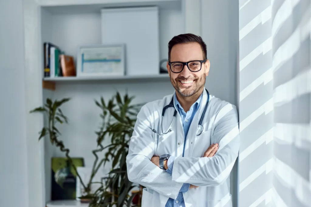 Confident doctor in a white coat with a stethoscope